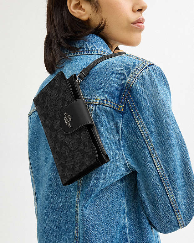 Coach Phone Wallet In Signature Canvas