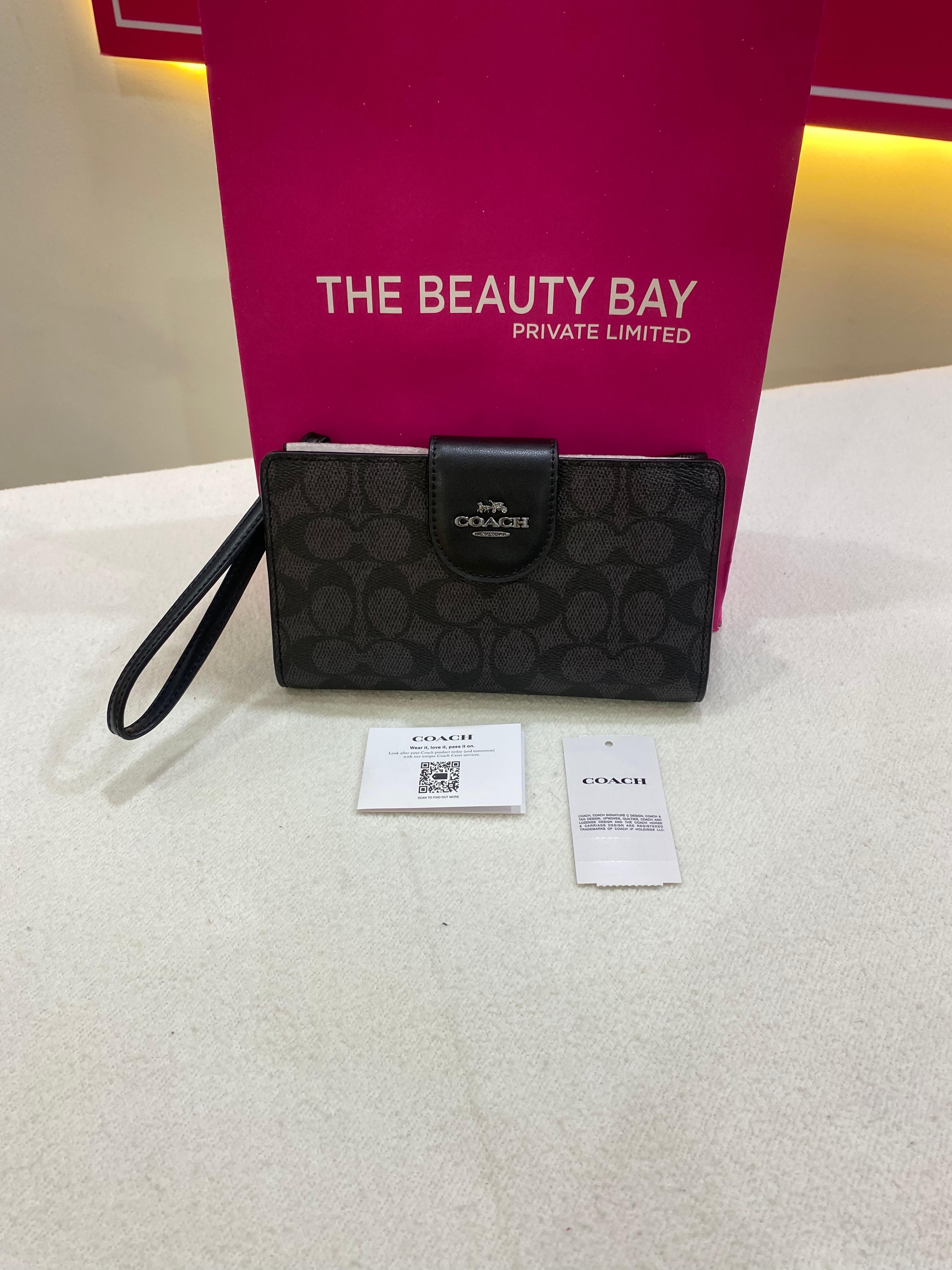 Coach Phone Wallet In Signature Canvas